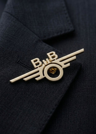 goldener Pin - Flügelrad